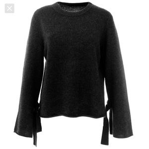 Black cashmere sweater with tie sleeves